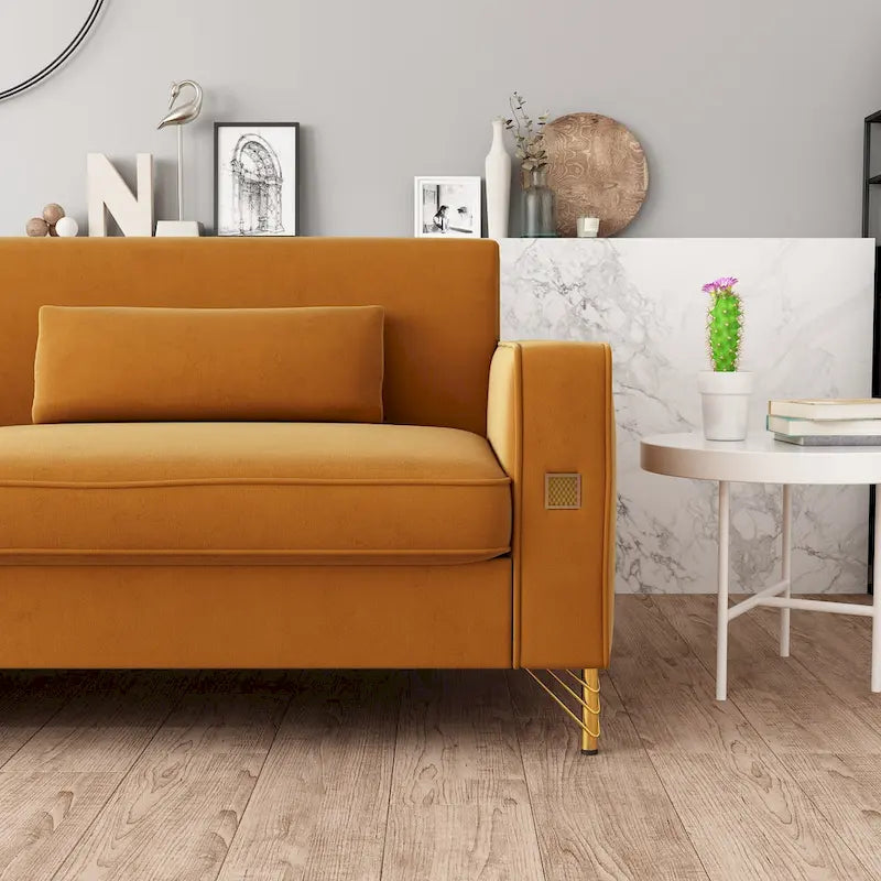 Canapé en velours de luxe avec accents dorés