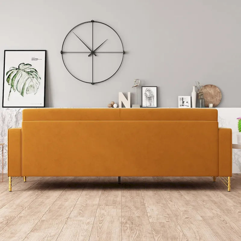 Canapé en velours de luxe avec accents dorés