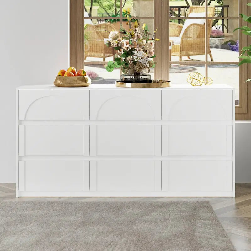 Commode blanche à 9 tiroirs au design moderne et dotée de dispositifs de sécurité